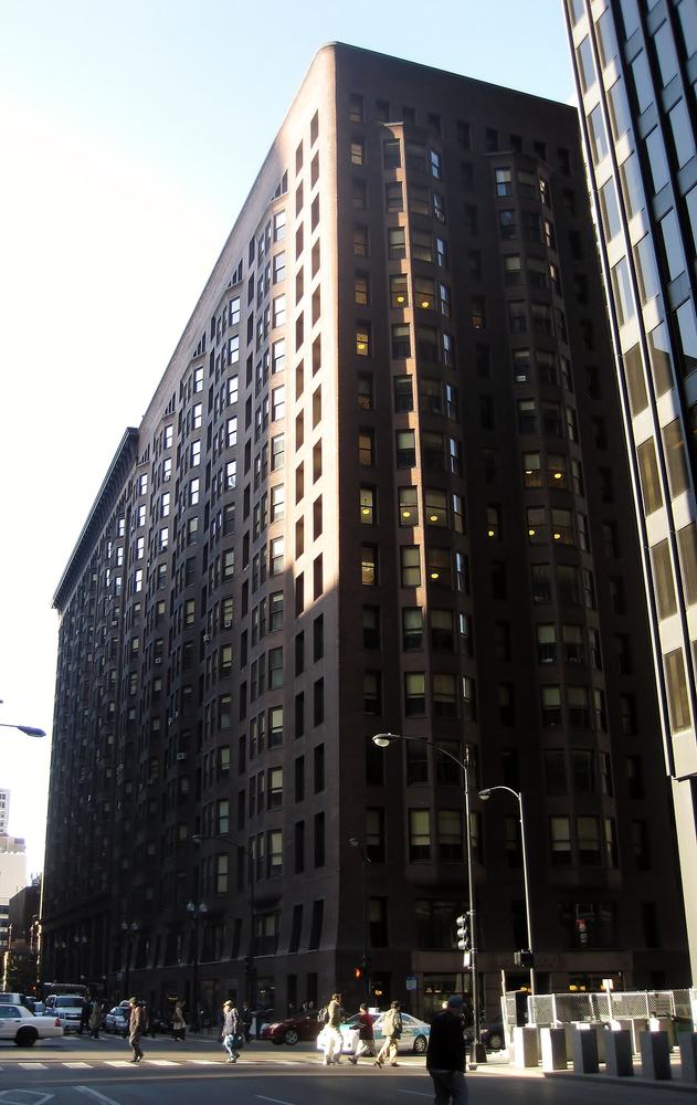 The dark unornamented brick walls of the Monadnock Building